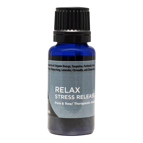 Blue bottle of Relax essential oil blend for stress release with ylang ylang and calming ingredients