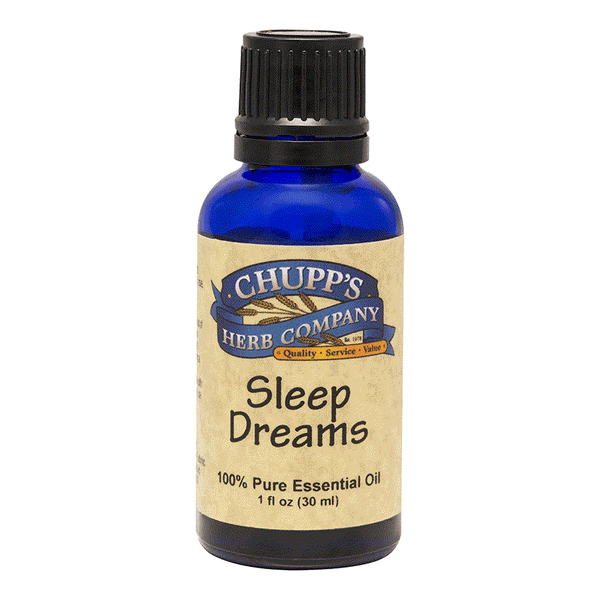 Sleep Dreams essential oil blend in blue bottle with lavender and ylang for calming and restful sleep